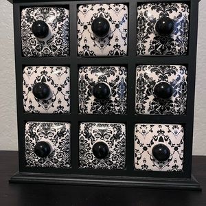 Spice or jewelry apothecary cabinet.